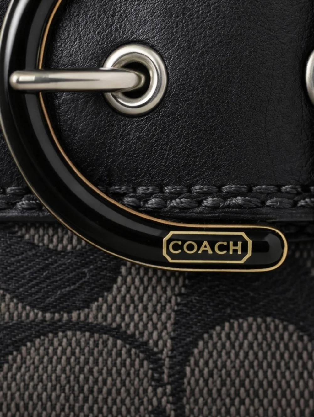 COACH Leather Signature Zip Wallet with Buckle Accent.